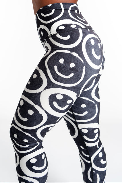 a person's butt in a tight black and white leggings